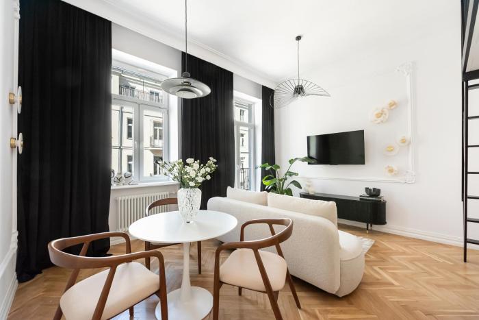 Wilcza Apartment with Mezzanine by BookingHost