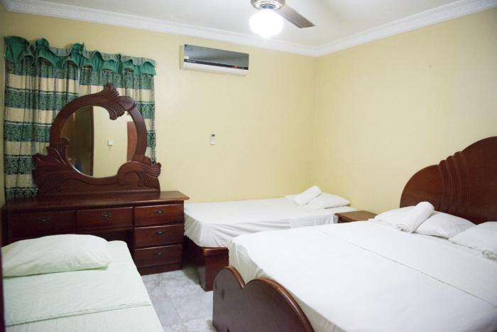 Modern 2BR Apartment Near SDQ Airport Santo Domingo Este Parking Wi-Fi
