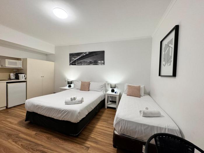 city staycation studio with 2 beds