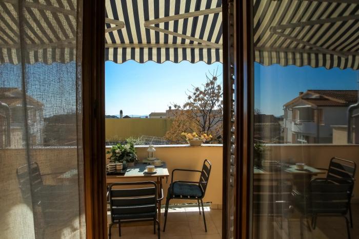 Cozy Retreat with Parking, Balconies & Garden Fireplace