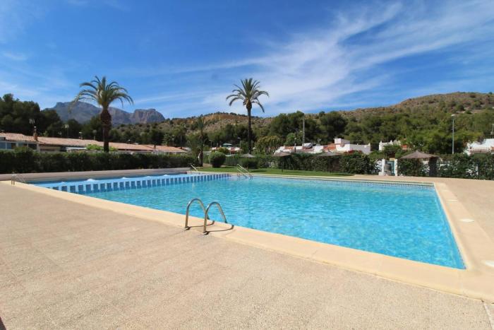 Casita con piscina comunitaria