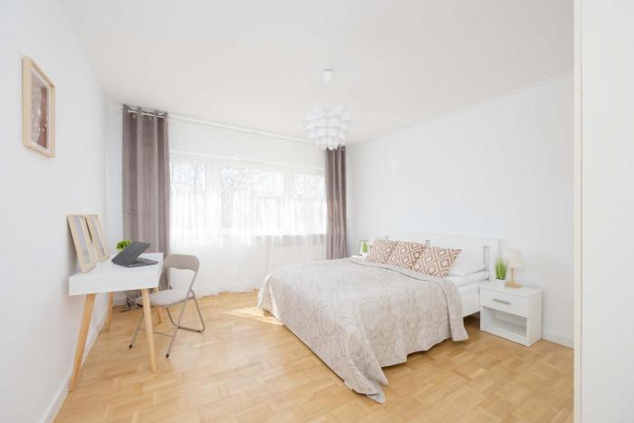 Bright Apartment in Warsaws Wola Next to the Metro by Noclegi Renters