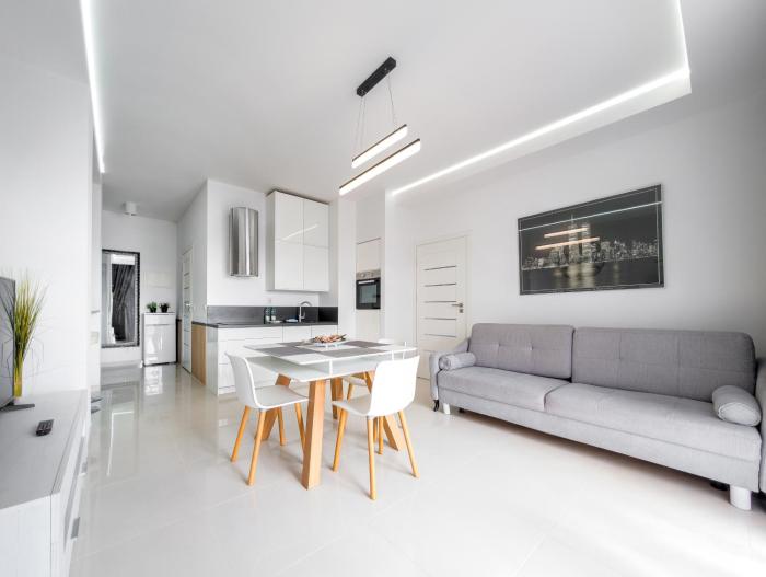 Riverside Harmony Chic Apartment by BookingHost