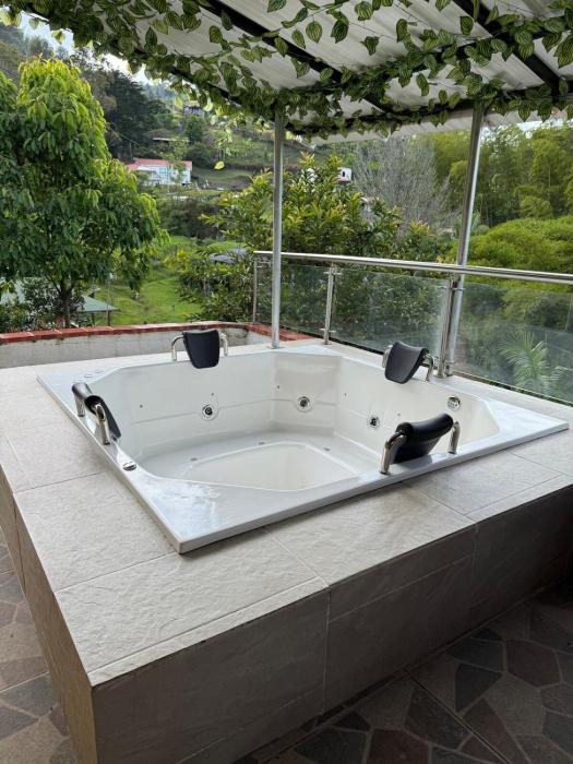 House near Marial stone and old Peñol replica