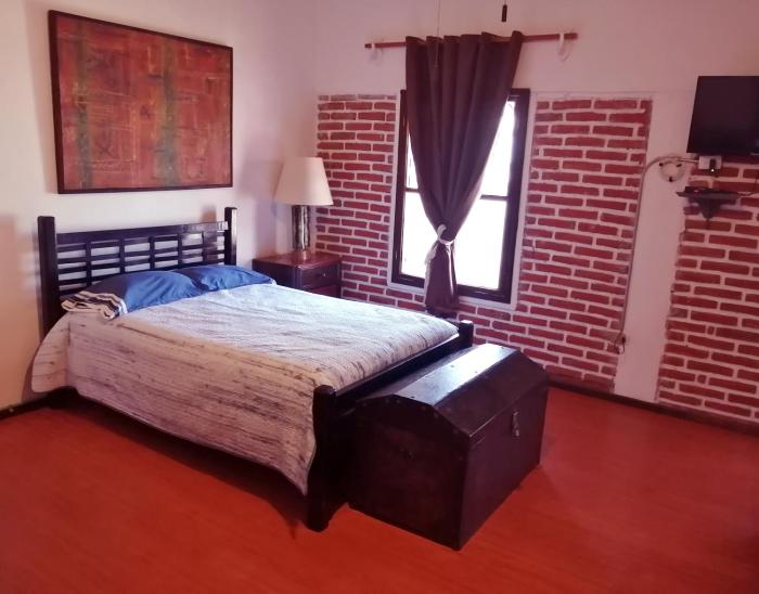 Cuarto tipo loft con terraza
