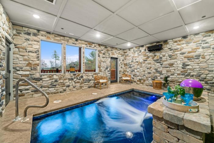 Cozy Cabin Sleeps 14 Near Dollywood with Indoor Pool, Hot Tub, Arcade and EV Parking Available