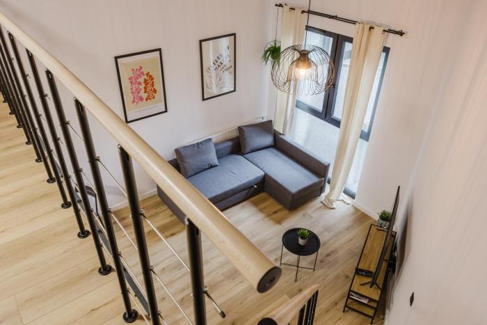 Osiedle Piastowskie Mezzanine Apartment by BookingHost