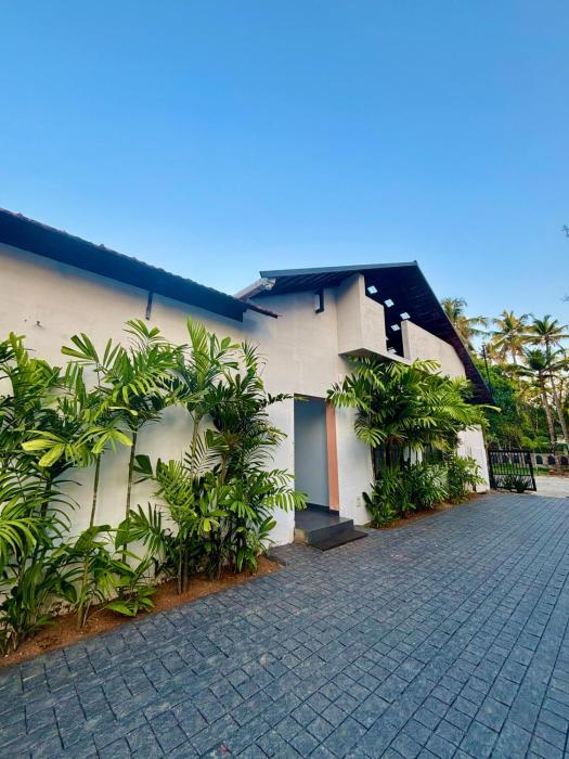 PPR Courtyard Guruvayur by LexStays