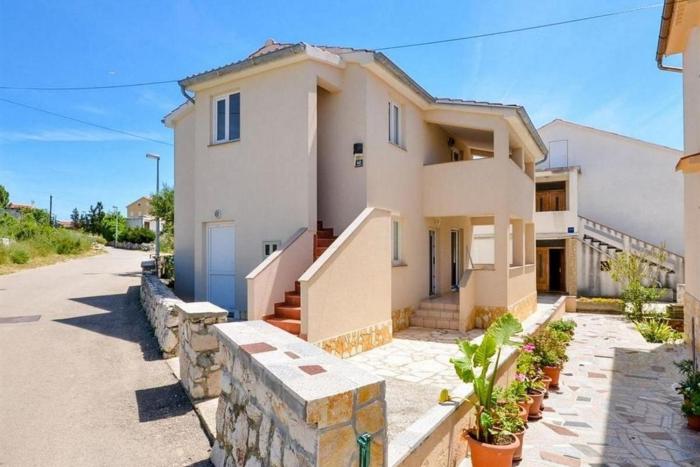 Apartments with parking space Novalja, Pag - 23663