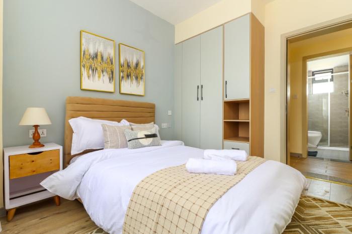 Elegant cozy two bedroom apartment with heated swimming pool well equipped gym ample parking space, children playing ground and amazing city views