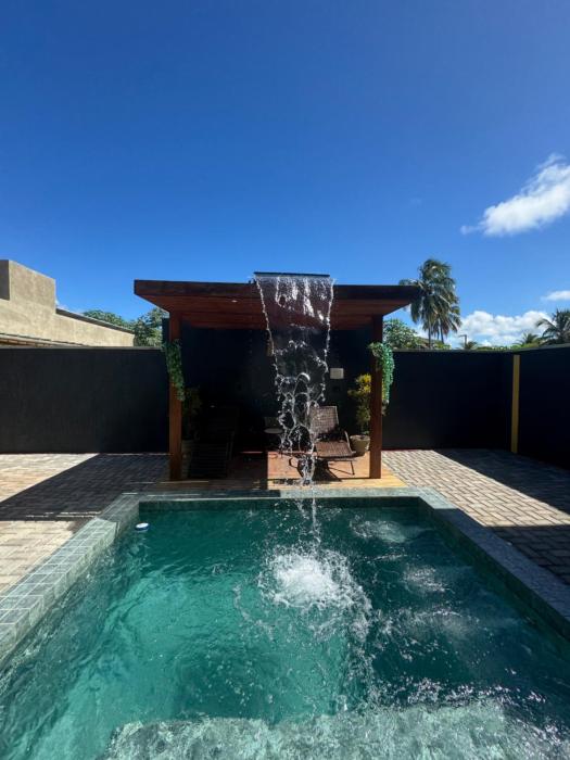 Casa com vista para o mar e piscina em Milagres