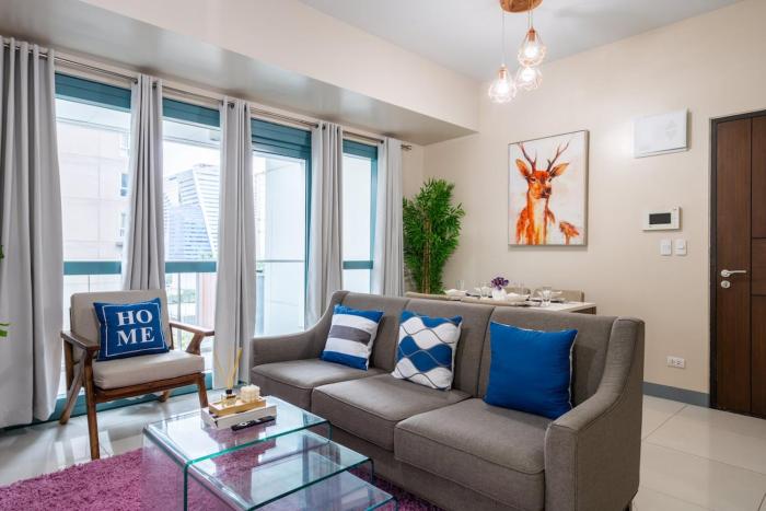 One Uptown Residence BGC 2BR Cor unit with balcony ,washer