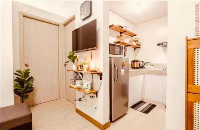 2 BR condo trees residences Netflix Games karaoke