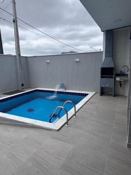 Casa com piscina em Peruíbe