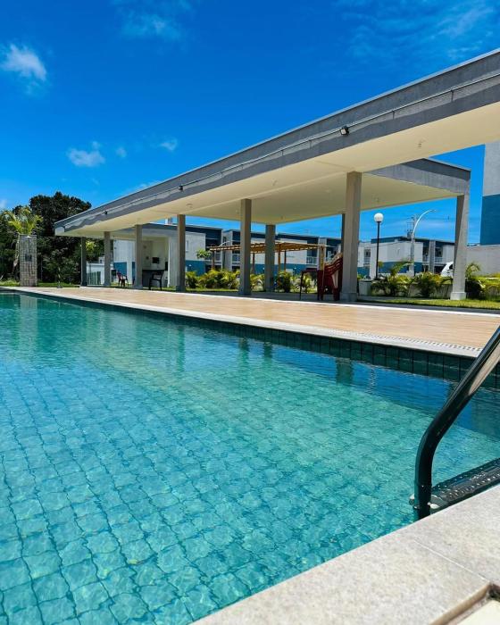 Aconchego da Alê em Porto, Ar condicionado e Piscina, Apartamento inteiro, Cozinha completa, Wifi, 02 Quartos confortáveis, travesseiro nasa , Colchão confortável ideal para férias descanso lazer ou negócios