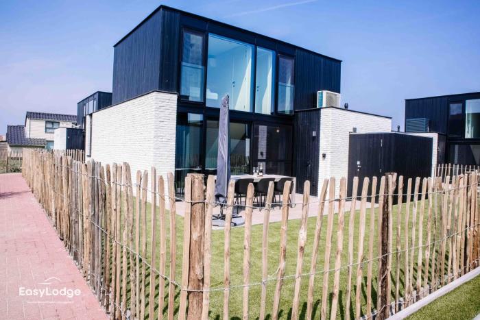 DUNE - Nieuwe vakantiewoning met tuin dicht bij strand