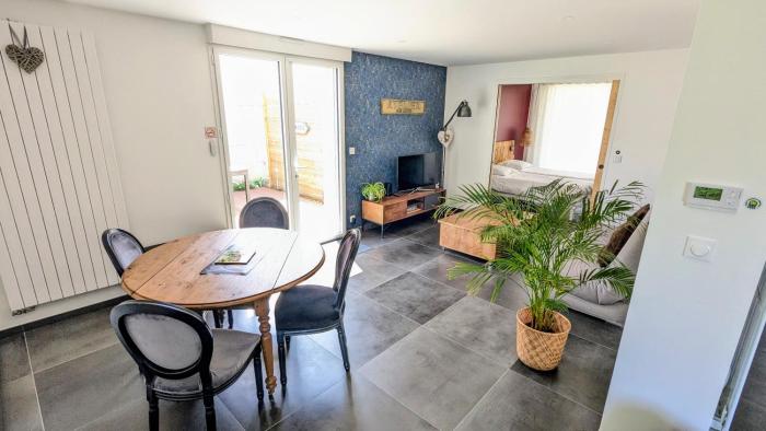 Cœurs de l ouest - appartement climatisé avec jardin et parking