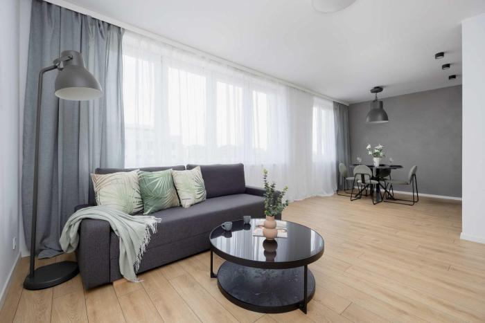 Modern and Bright Apartment with Parking Perfect for Remote Working by Noclegi Renters
