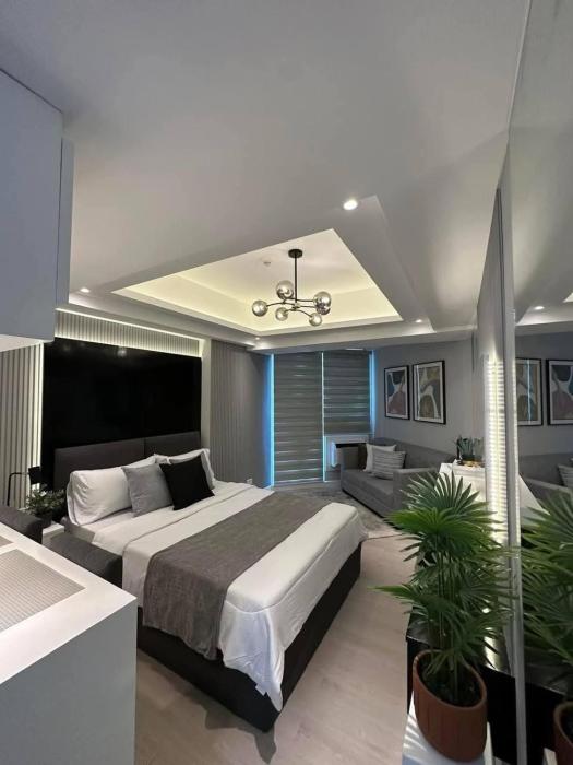 Stylish Stay at Azure North near Malls and Tourist Destinations