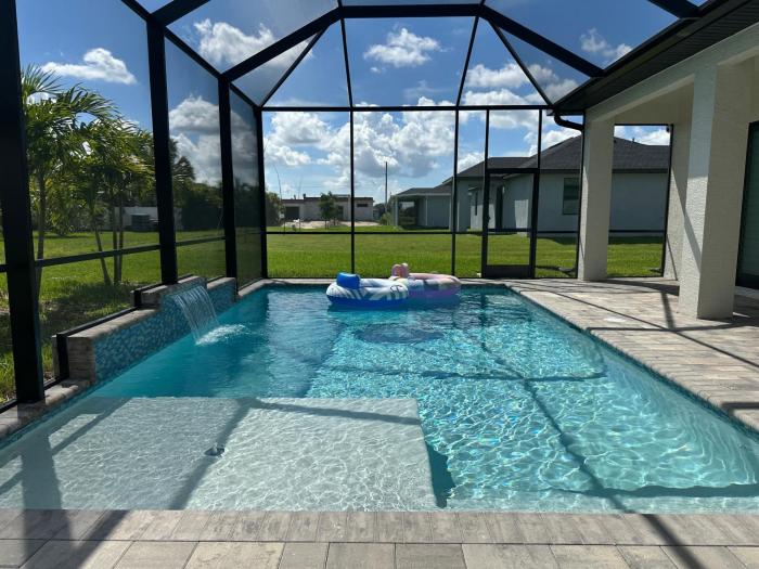 Brand New Luxury 4 bedroom heated pool home