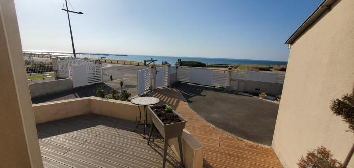 Vent dange maison familiale face à la mer