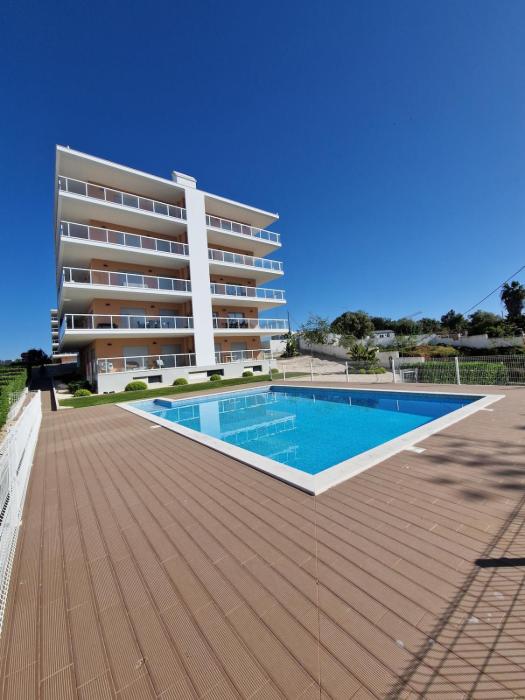 Modern apartment with pool and close to the beach