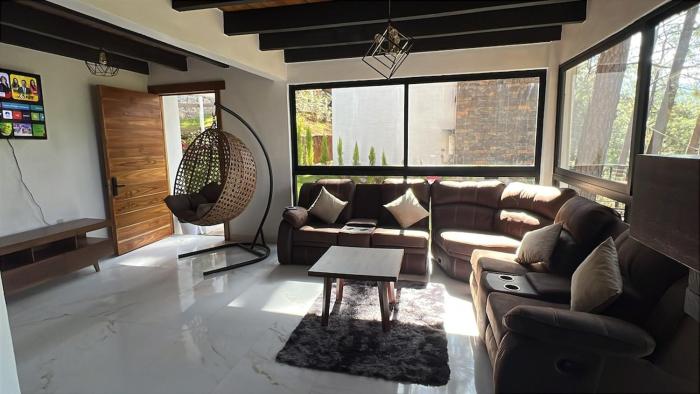 Hermosa cabaña en el bosque