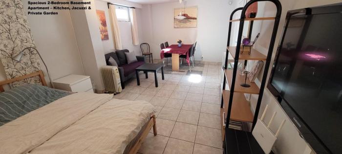 Spacious 110m2 2BR Basement Retreat, Jacuzzi, Table Tennis & Garden Access