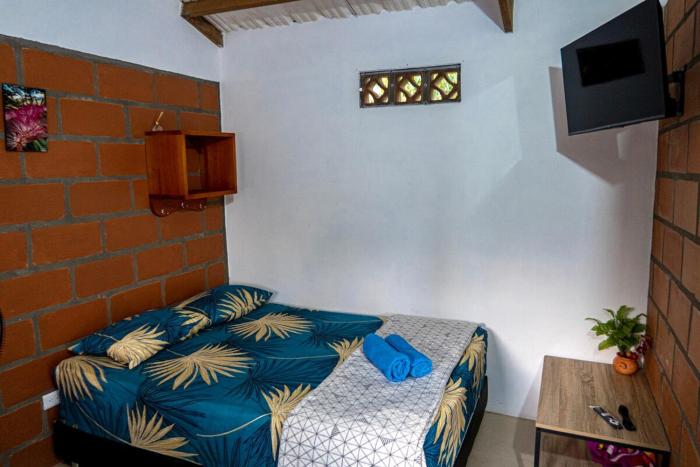 Habitación para 3 con acceso al rio y baño privado en San Rafael Antioquia