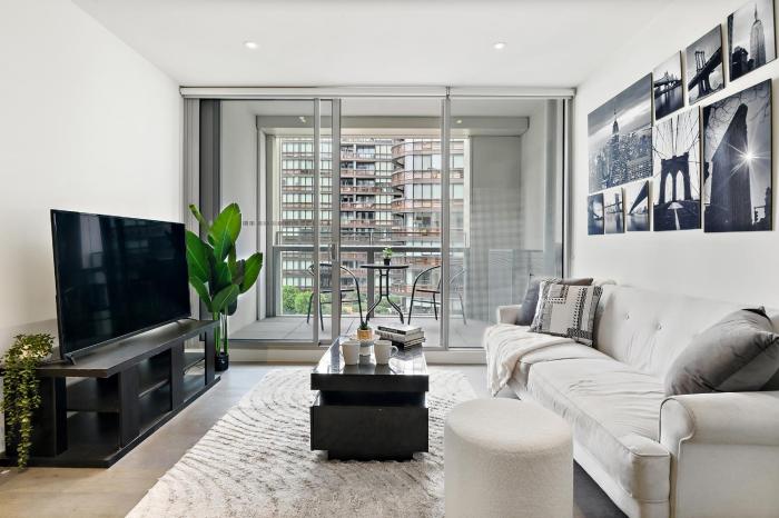 High-Rise 2BR Luxury Apartment NYC-Inspired Design with Pool Gym Parking and Waterfront Views