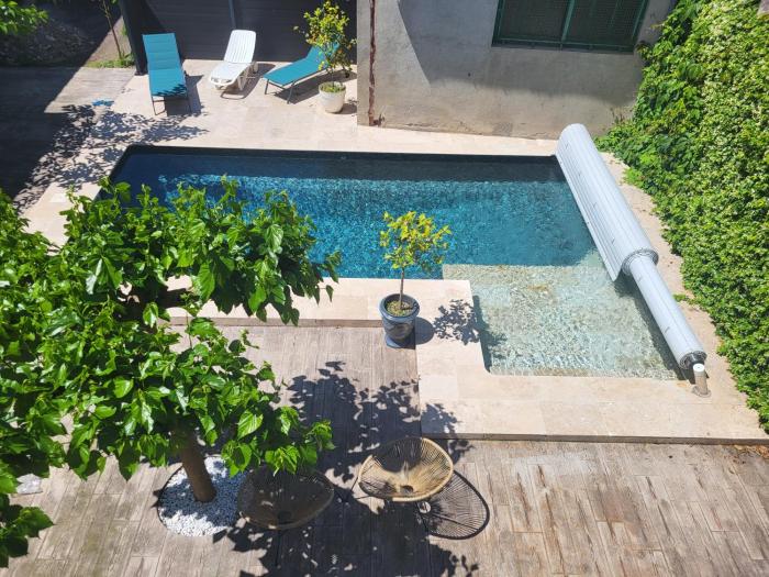 Appartement avec piscine partagée