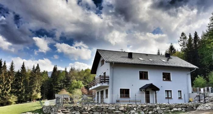 Pokoje Gościnne Pod Lasem