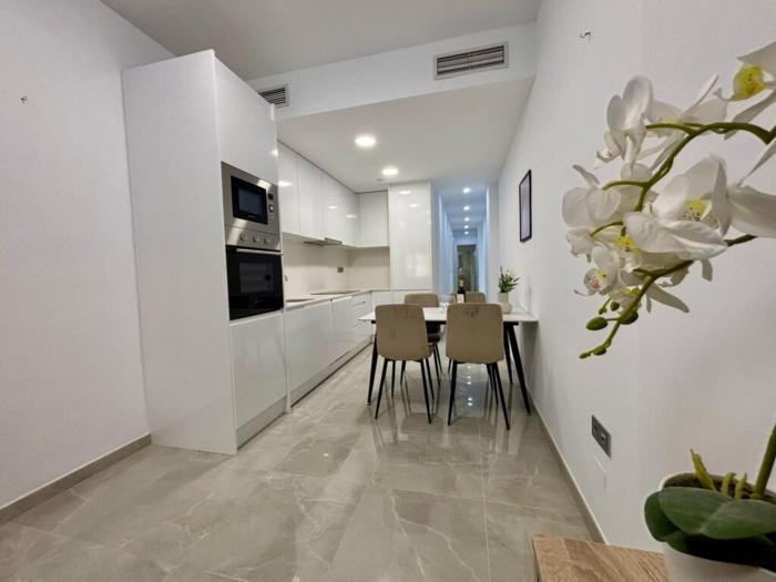 Apartment near Playa de Cura with a rooftop swimming pool