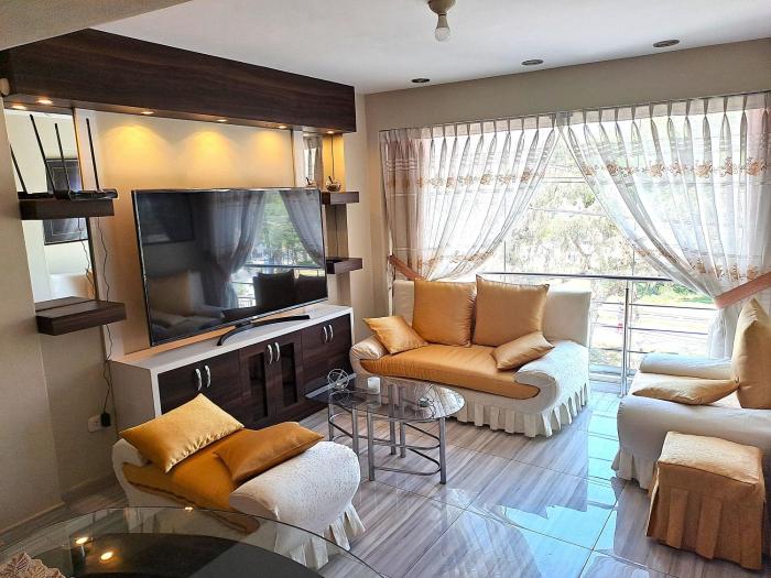 Departamento céntrico y familiar de tres habitaciones frente a parque-301