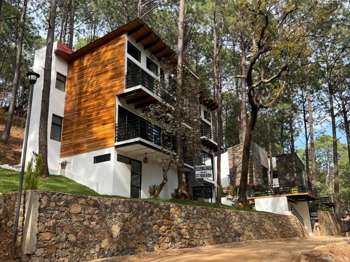 Hermosa cabaña en el bosque