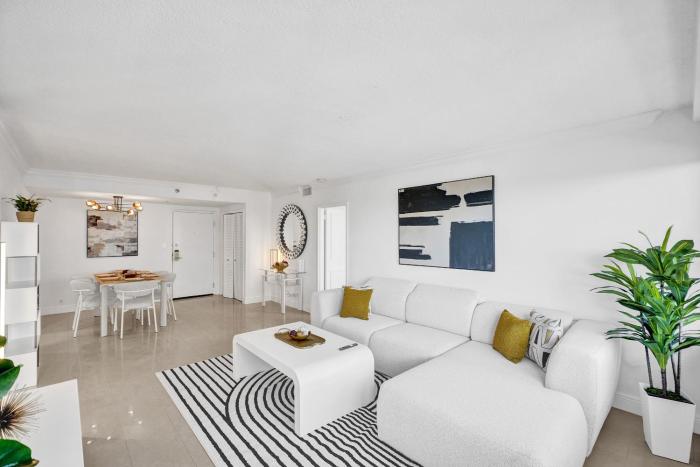 Modern Ocean Escape Stylish 2BR Condo with Resort Amenities Pools Sauna and Gym 1417