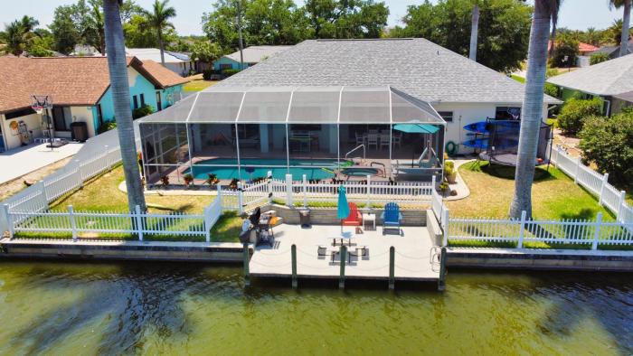 Luxury Waterfront Vacation Home with Dock and free heated Pool