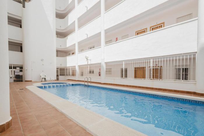 Apartamento con Piscina Centrico