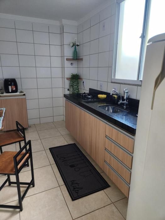 Apartamento confortável com garden