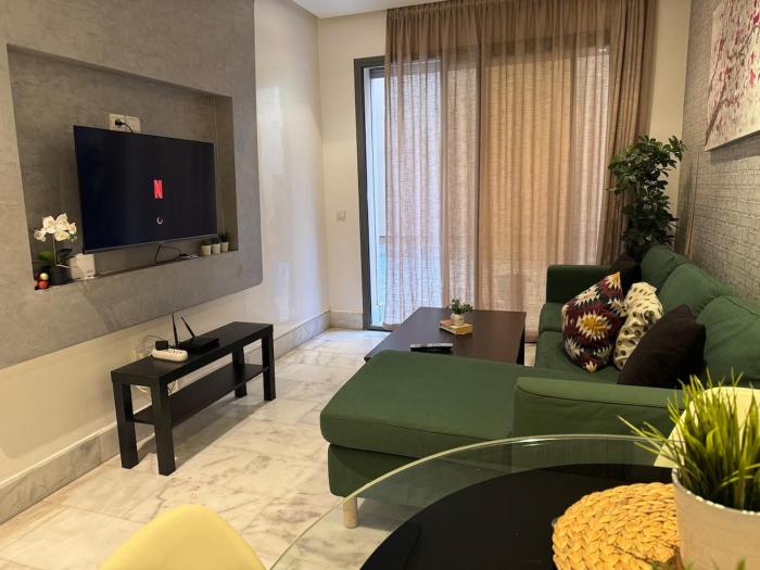 Modern studio with large terrace and parking