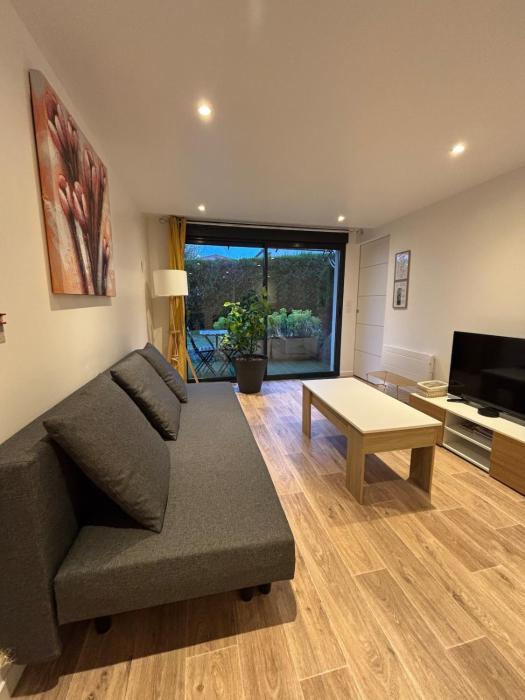 Appartement chez maison hôte rez de jardin