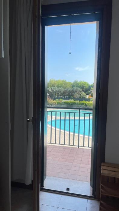 Casa Origine, appartamento vista piscina, al mare