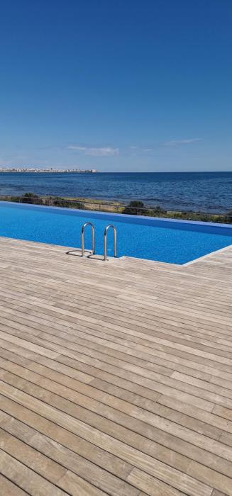 Posidonia Apartment, ground floor with garden,3 swimming pools, jacuzzi,parking space