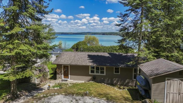 Beautiful Torch Lake House with Beach Access home