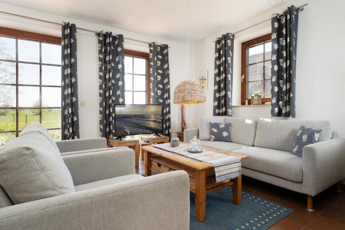 Ferienhaus May App 1