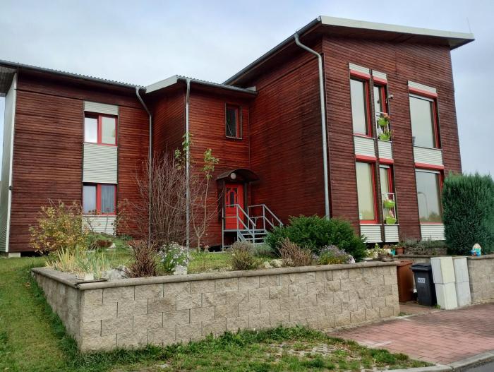 Apartmán v dřevěném domě