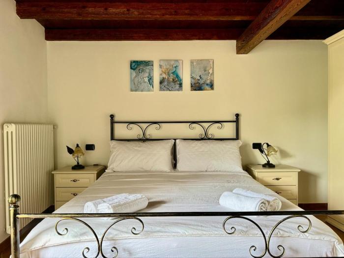 A house between a waterfall and a lake the enchantment of Nesso