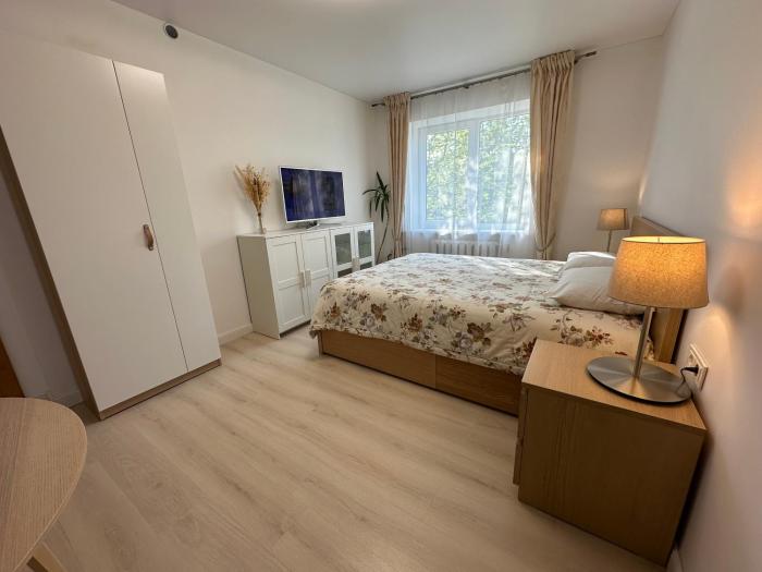 Apartamentai šalia baseino