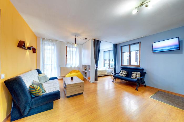 Colorful Retreat - 1BD next to the slopes by Flat Manager