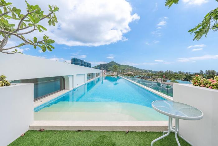 C190 Sleek 1BR with Infinity Pool, Gym, Rooftop